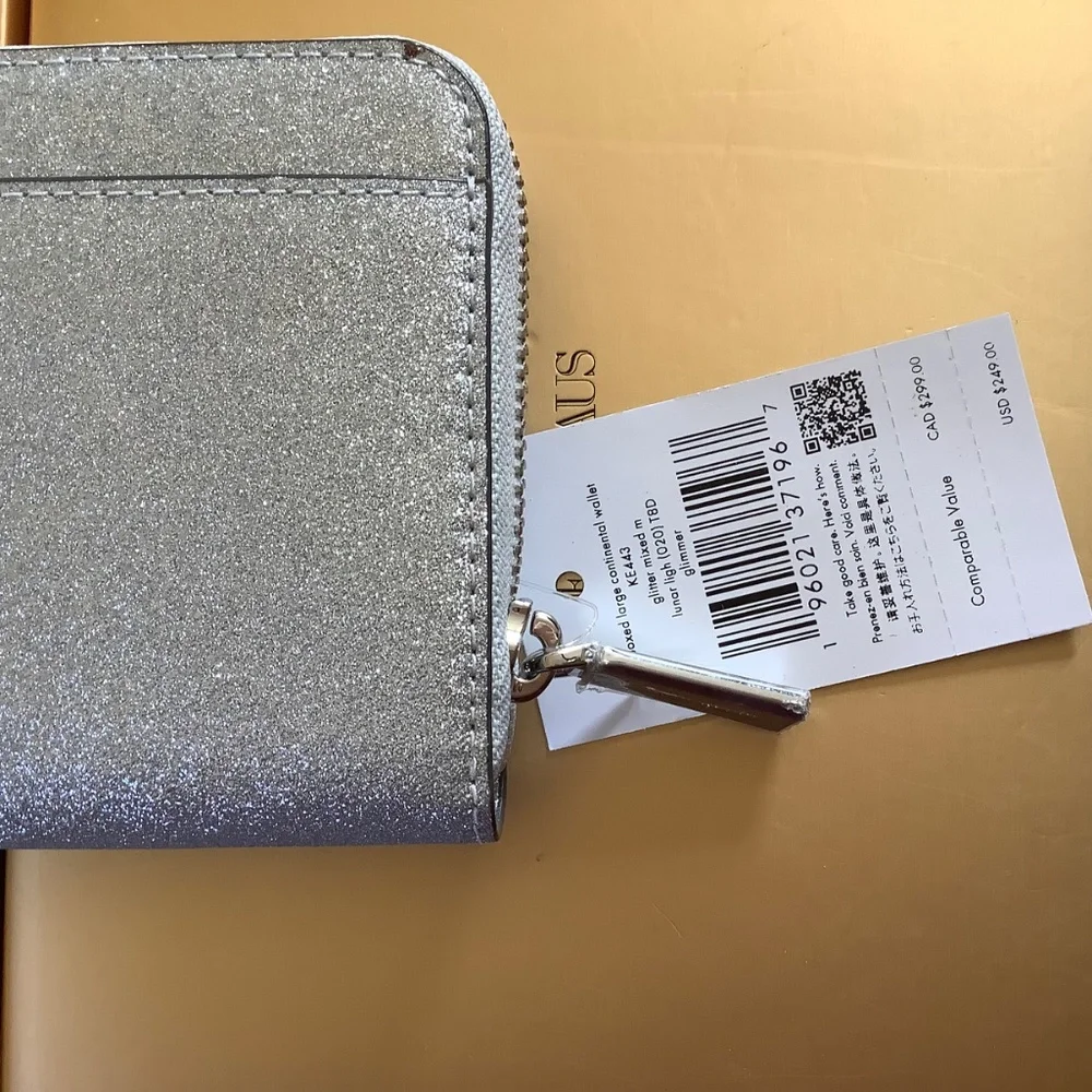 Kate Spade New York GLIMMER LARGE CONTINENTAL WALLET Silver